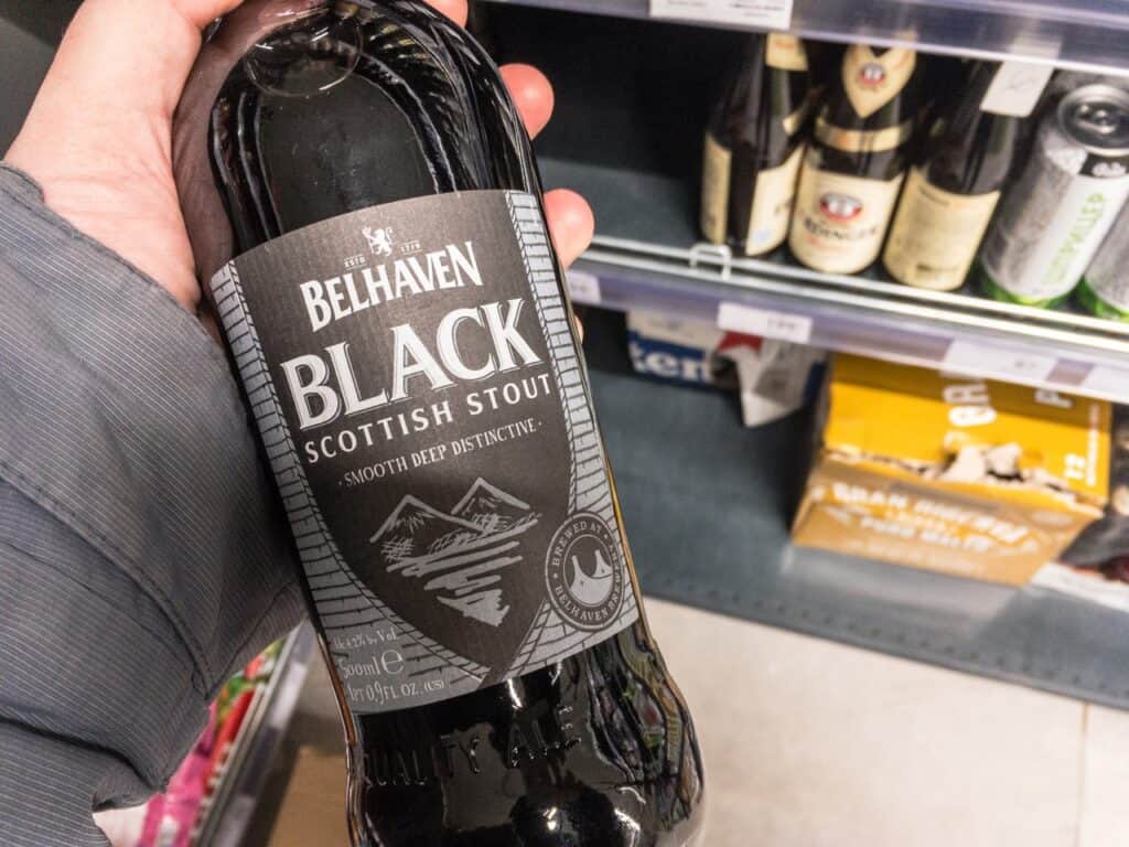 Picture of a hand holding a bottle of Belhaven Stout beer. Belhaven Brewery is a brewery based in Belhaven, Scotland. The brewery dates from 1719, at least; by 2005 it had become the largest and oldest surviving independent brewery in Scotland.