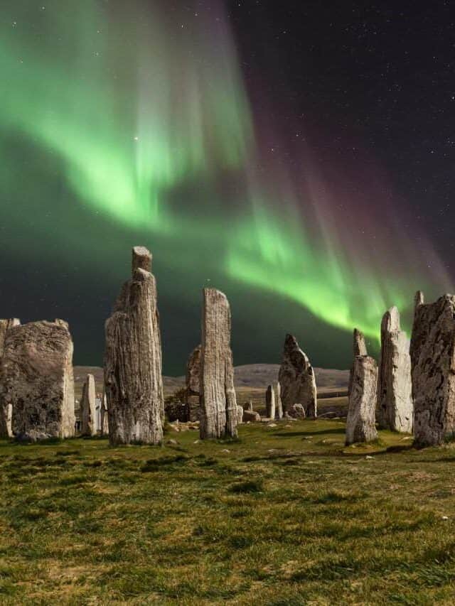 The Callanish Stones with the northern lights over them for "Can you see the Northern Lights in Scotland?"