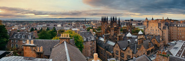 Edinburgh city rooftop view with historical architectures. United Kingdom.