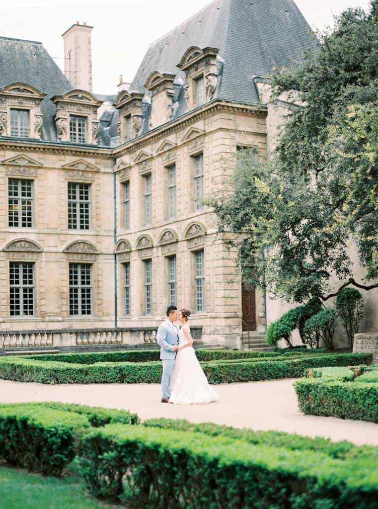 Couple Standing in front of a Castle