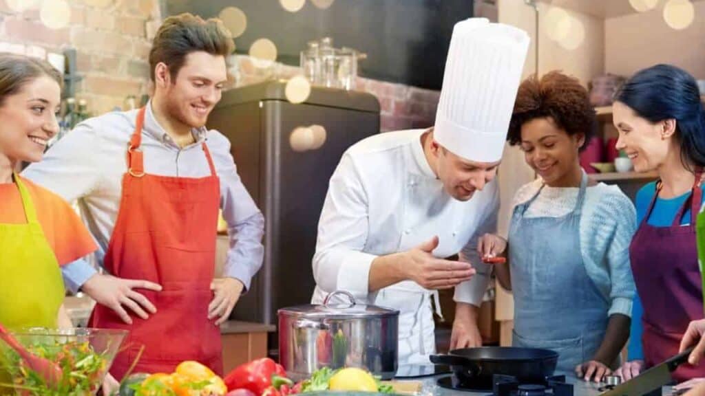 Group of people taking a cooking class