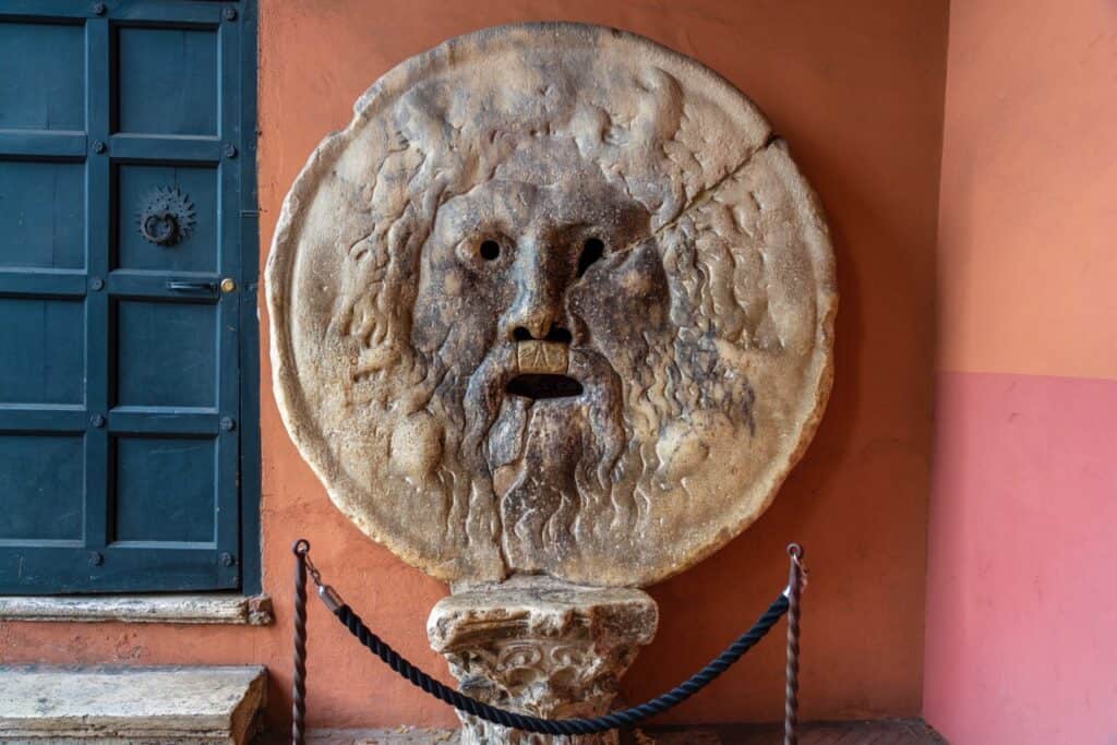 Rome, Italy - december 19, 2020: Detail of Mouth of Truth, a worldwide famous enormous marble mask said to bite the hand of those who lied, in Rome, Italy