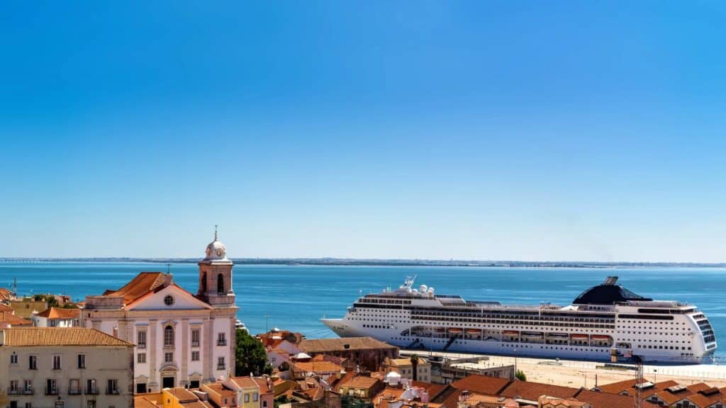 Panorama view of Lisbon with a cruise ship docked on the river