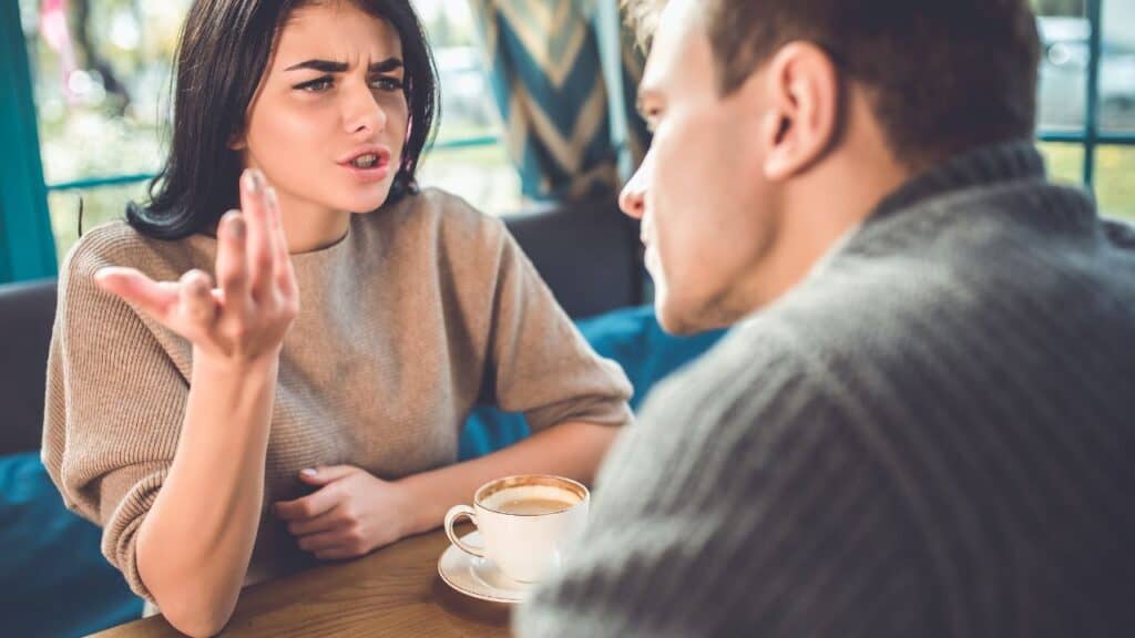 The man and woman quarreling in the restaurant