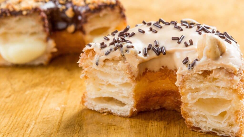 Donut cronut on a wooden table