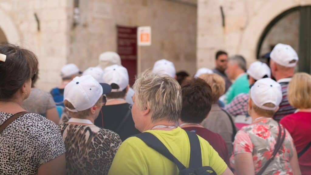 Large group of tourists on a guided tour