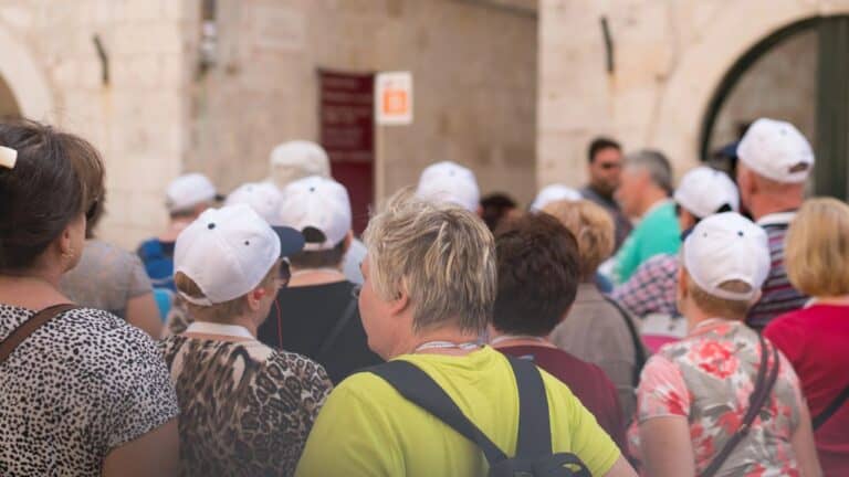 Large group of tourists on a guided tour