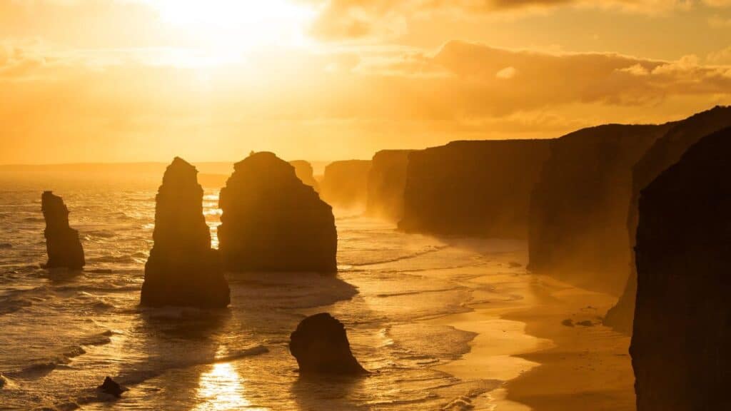 Backlit 12 Apostles golden sunset, Princetown, Australia