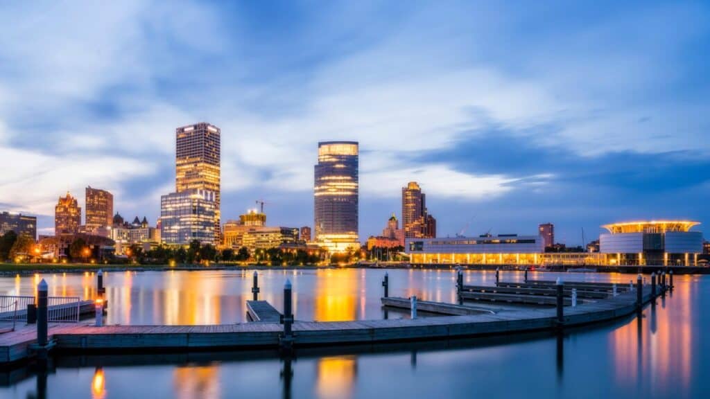 Beautiful milwaukee at night with reflection in water ,wisconsin,us