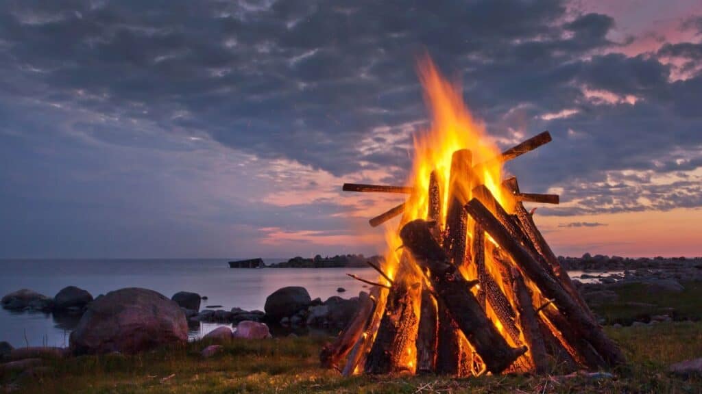 Bonfire on the beach at sunset