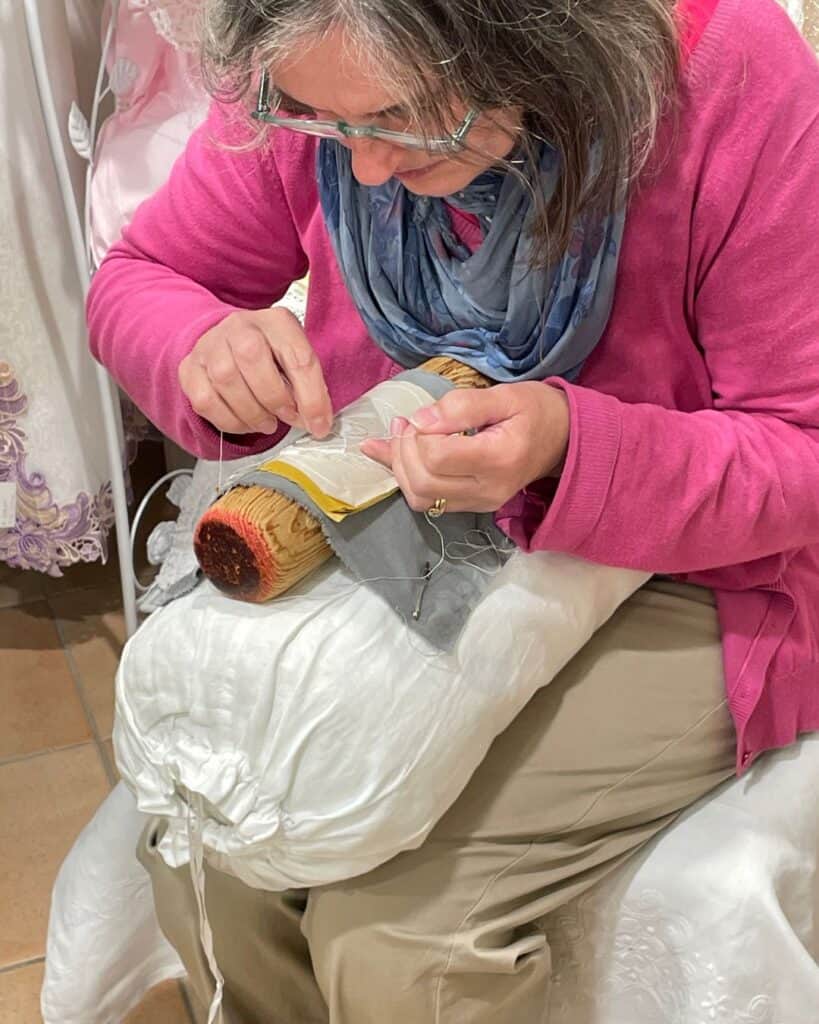 Lace making demonstration on Burano Island in Venice Italy