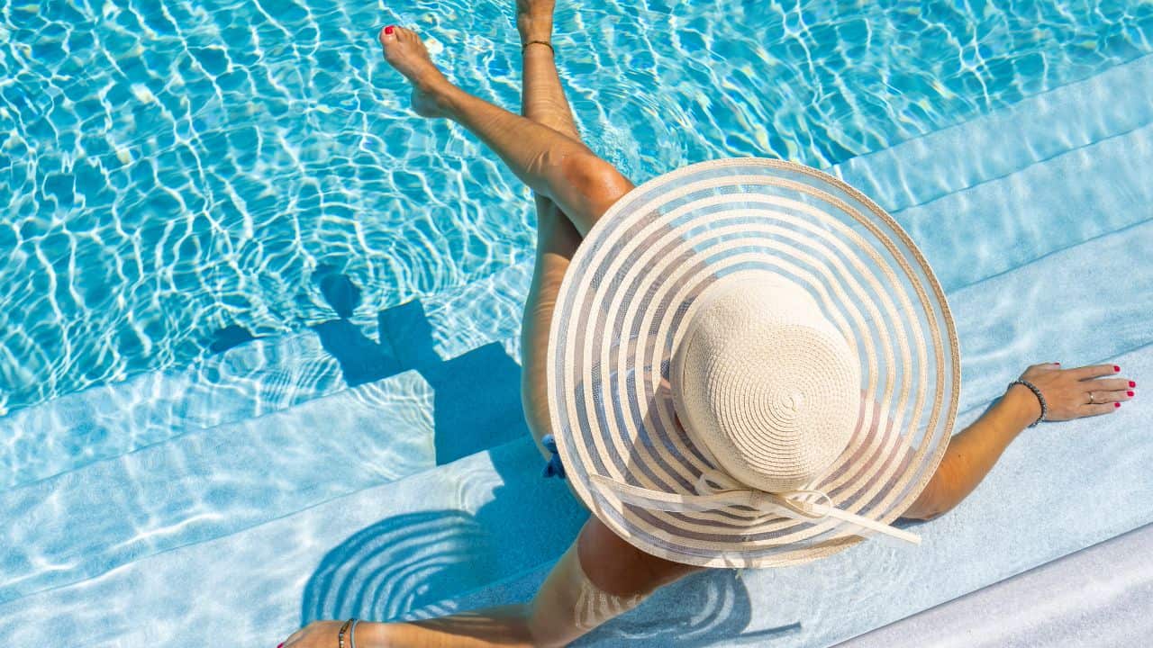 Woman in Luxury Spa Resort Pool